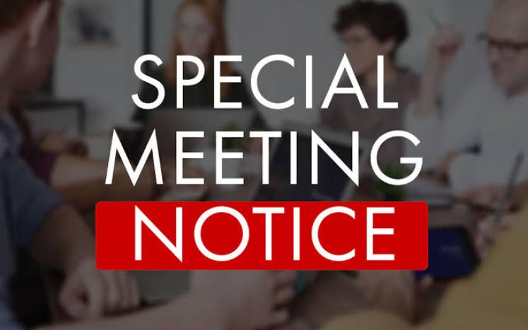 sign that reads "Special Meeting Notice"